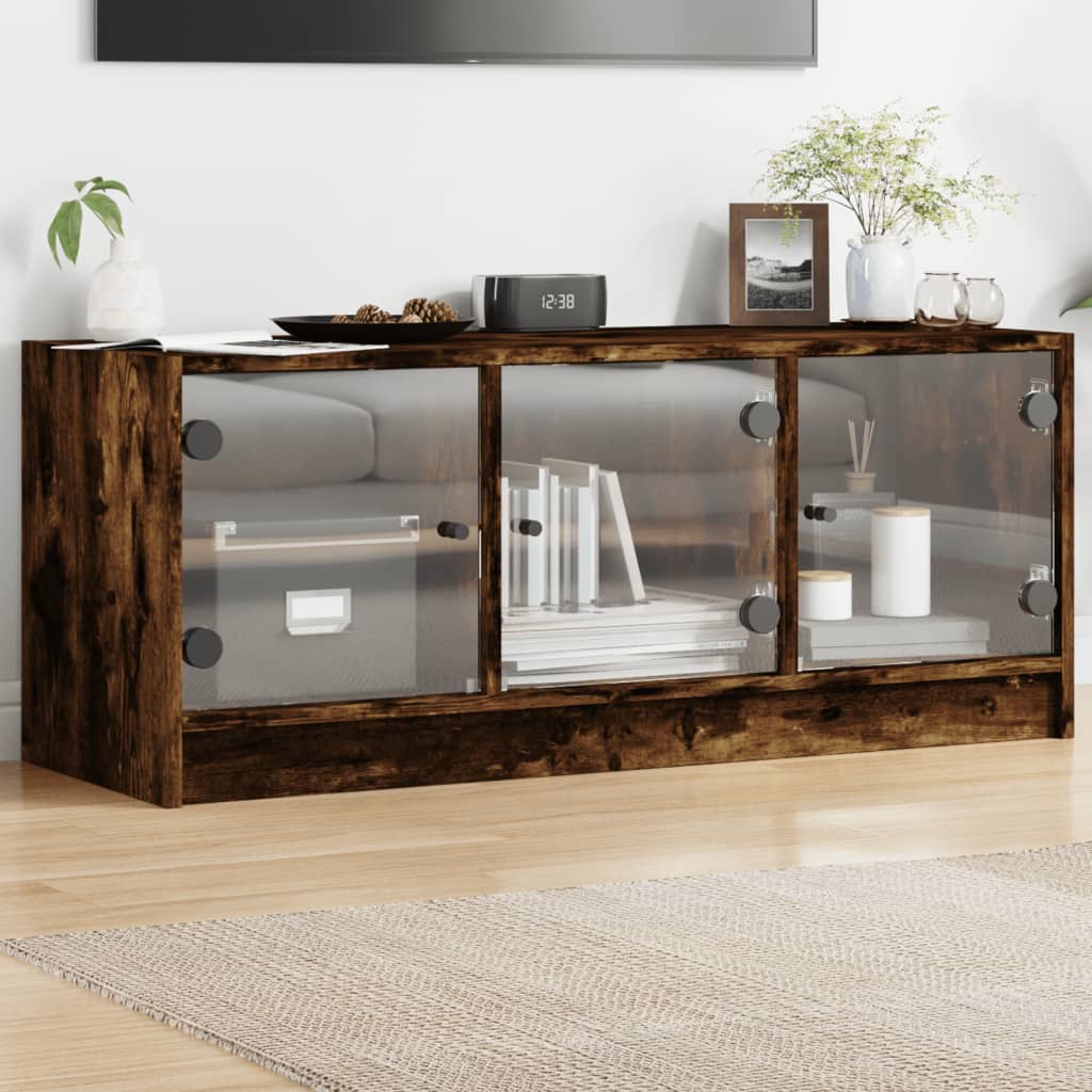 VXL8721012213609_m_en_hd_1.jpg vidaXL TV skrinka so sklenenými dvierkami dymový dub 102x37x42 cm – Obrázok 1