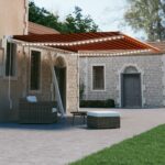 vidaXL Ručne zaťahovacia markíza s LED 400x300 cm oranžová a hnedá