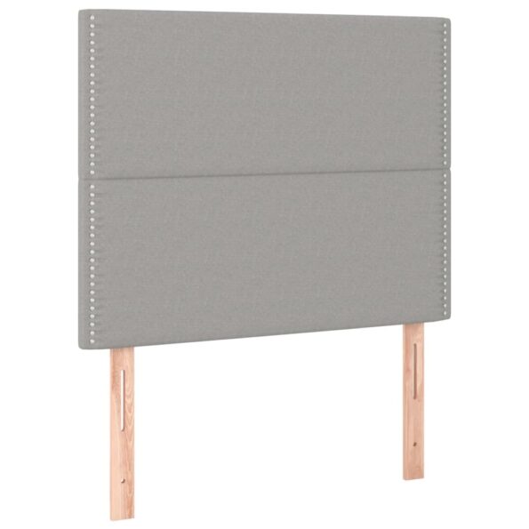 VXL8720287240389_a_en_hd_1.jpg vidaXL Čelá postele 2 ks bledosivé 90x5x78/88 cm látka – Obrázok 2