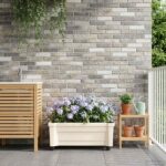 vidaXL Kvetináč Calypso s kolesami Biela 79 x 35 x 33 cm PP
